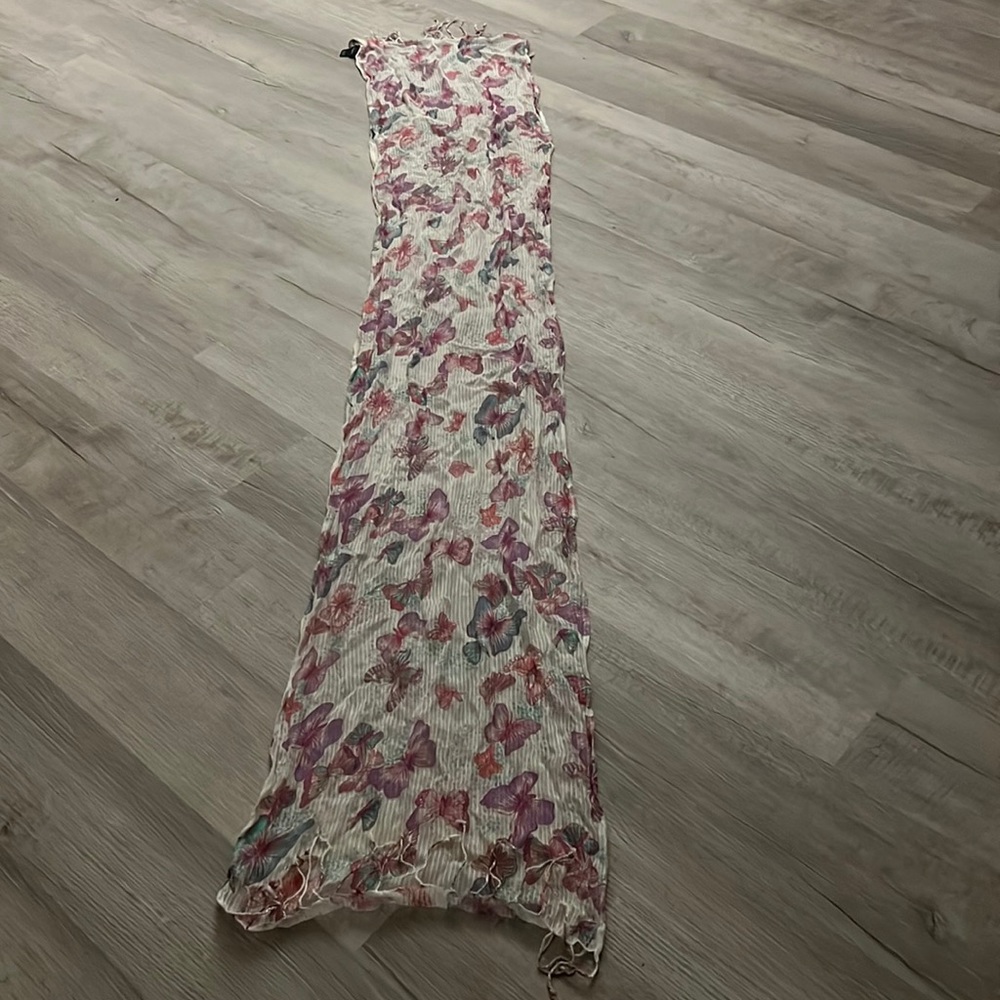 Some kind of butterfly throw.   Scarf maybe.